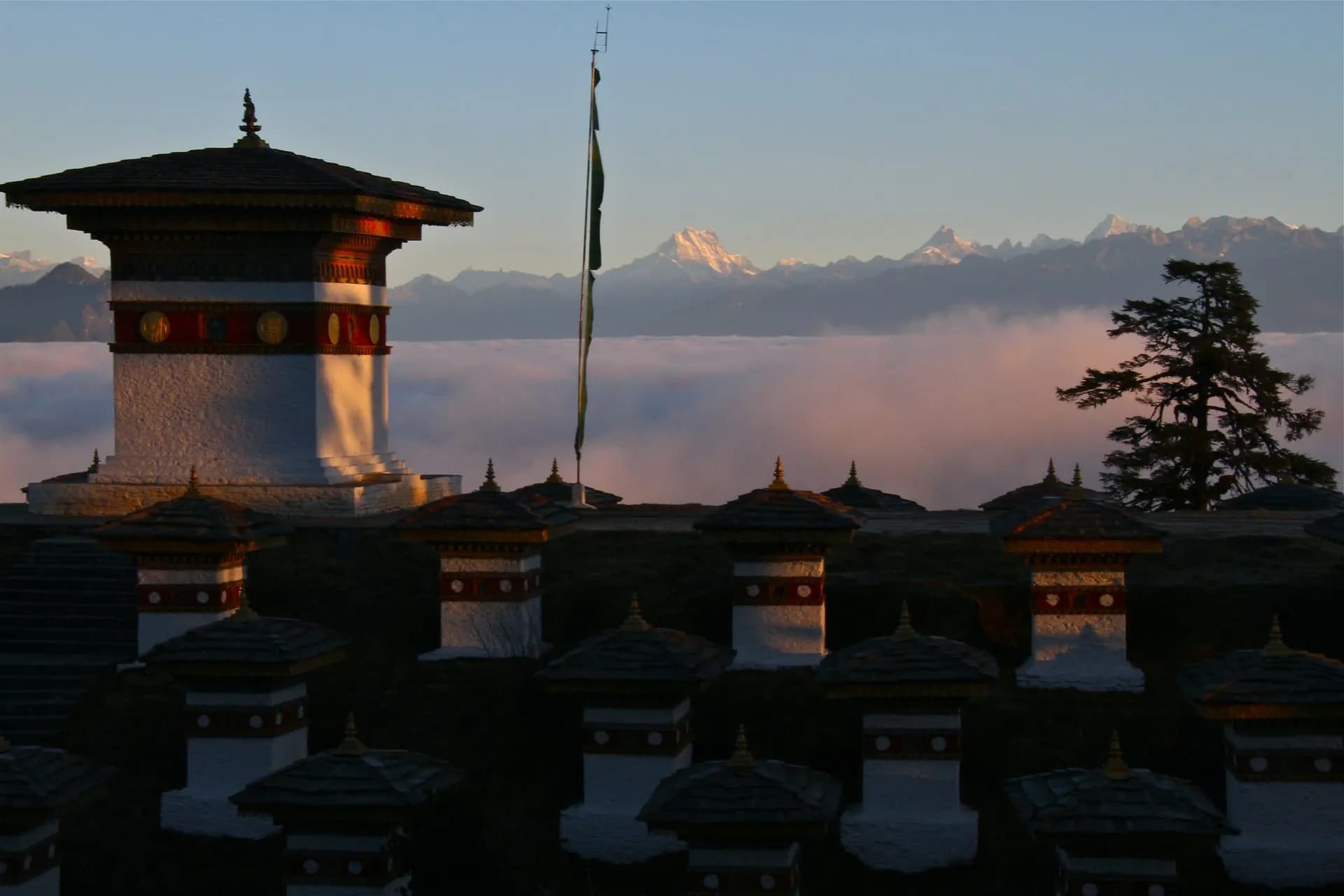 Wide cinematic Bhutan landscape with mountains and traditional architecture